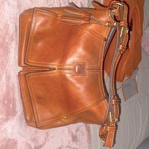 Dooney Bourke tan leather saddle bag